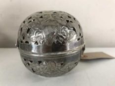 A continental silver metal spherical pierced casket