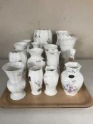 A tray containing fifteen Aynsley little sweetheart bone china vases,