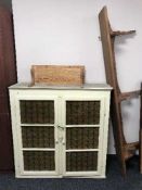 A painted pine glazed wall cabinet and a two pine wall shelves