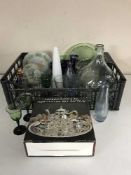 Three crates containing large quantity of continental glassware including bottles, drinking glass,