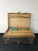 An early 20th century oak bound trunk together with a folding picnic table with stools