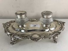 A silver plated desk stand
