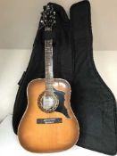 An Eros Spanish Acoustic guitar in carry case (one string broken)