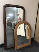 An antique mahogany framed mirror together with a pine framed bevelled mirror