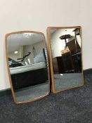 Two 1970's mirrors on teak boards