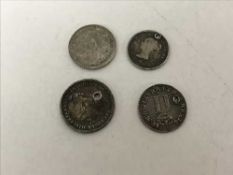 Four silver coins inc.