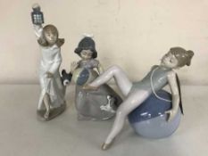 Three Lladro figures - Girl in nightdress with lantern (boxed),