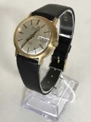 A Rare Gents gold Bullova Accuquartz Day Date Wristwatch