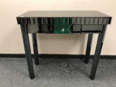 A pair of mirrored side tables fitted a drawer (2)