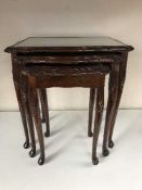 A nest of three inlaid mahogany tables