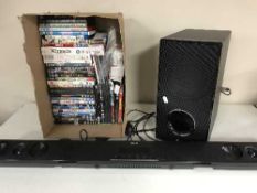 A LG soundbar and speaker together with a box containing assorted DVD's, CD's,
