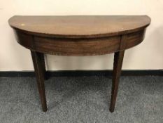 A pair of early Georgian d-shaped tables, width 123 cm.