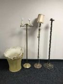 Three continental metal standard lamps with shades