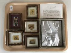 A tray containing framed gilt miniatures,