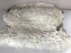 Two sheepskin rugs