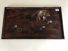 An early 19th century Japanese tray with brass and mother of pearl inlay