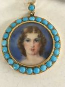 A gold, turquoise and diamond set locket,