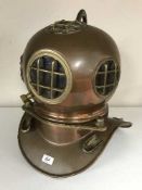 A reproduction copper and brass diver's helmet