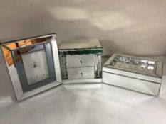 A contemporary mirrored all-glass jewellery box,