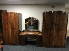 A four-piece 1930's walnut bedroom suite comprising of lady's and gent's wardrobe,