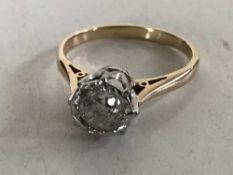An 18ct gold diamond solitaire ring approximately 1ct.