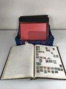 Three folders and one stamp album containing a quantity of miscellaneous stamps of the world
