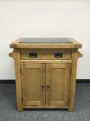 A good quality light oak kitchen island with black granite top, width 80 cm x 60 cm,