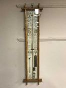 An Admiral Fitzroys oak framed barometer