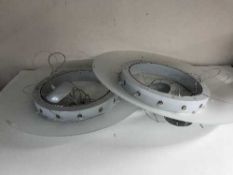 A pair of contemporary Murano Due circular light fittings