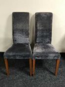 A set of six contemporary upholstered high-backed dining chairs