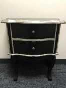 A black and silver French style two-drawer chest