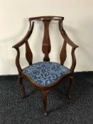 A mahogany Queen Anne style corner armchair