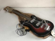 A Raver electric guitar with lead and strap in carry bag