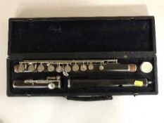A mid twentieth century three-piece flute by Besson, London, cased.