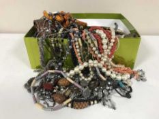 A box of costume and silver jewellery, two hand mirrors,