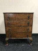 A walnut Queen Anne style four drawer chest