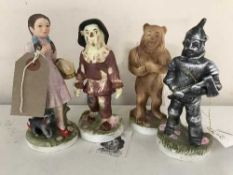 A set of four Mann Wizard of Oz figures