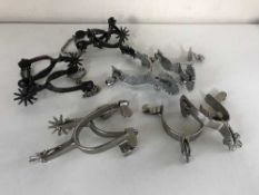 A basket of five pairs of spurs