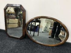 Two early 20th century oak framed bevelled mirrors