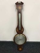 A Victorian inlaid mahogany banjo barometer with silvered dial signed G Vitta