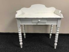 A painted antique pine wash stand on bobbin legs