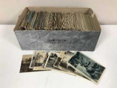 Two boxes of foreign postcards