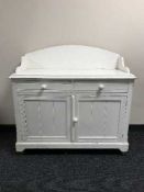 An antique pine painted wash stand