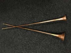Two large brass and copper horns