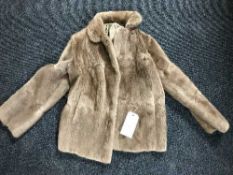 A lady's musquash fur coat