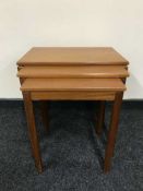 A nest of three teak Mackintosh tables