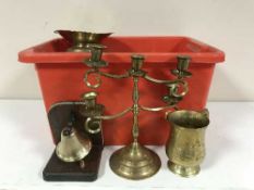 A box of brass and copper ware, tankard, candelabra,