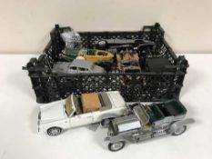 A crate containing seven large scale die cast vehicles including a 1907 Rolls Royce Silver Ghost by