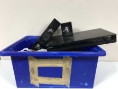 A box containing a Panasonic DVD surround sound system together with a Samsung surround sound