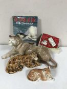 A large Melba ware china figure of a lioness, together with two other figures of big cats,